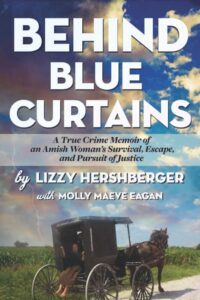 behind blue curtains